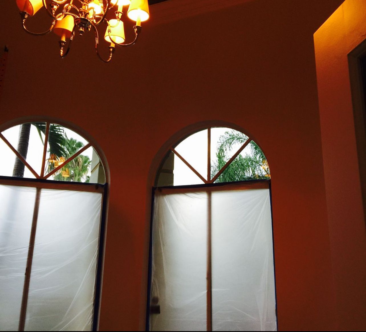 Interior painting orange arched windows